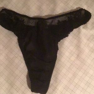 Thong with mesh and floral appliqué
